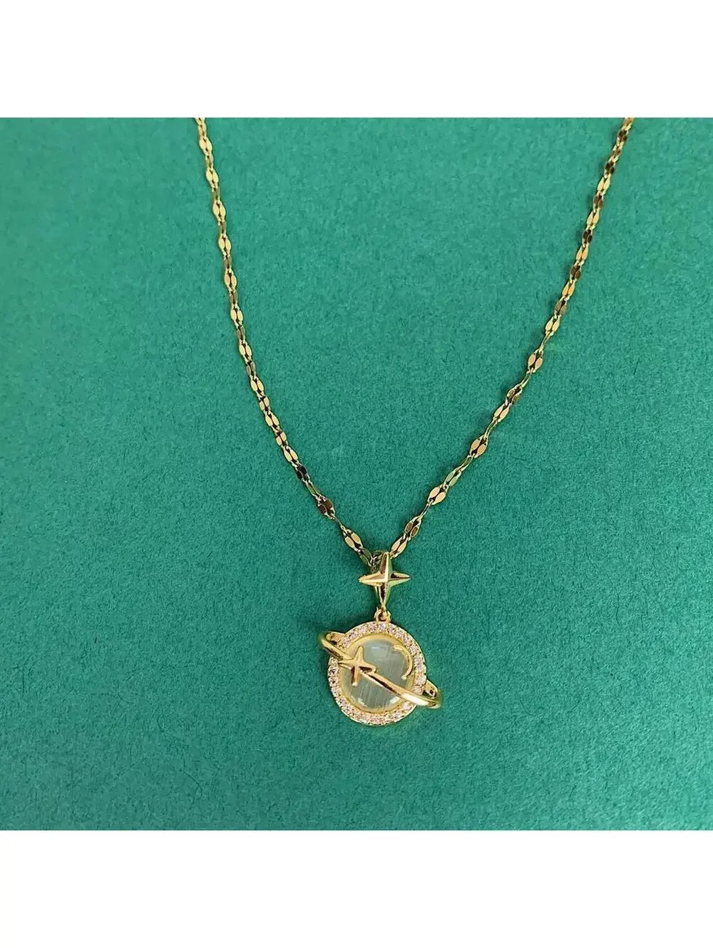 Y2k gold opal planet pendant opium necklace. Cool design. Chain is unisex. 18